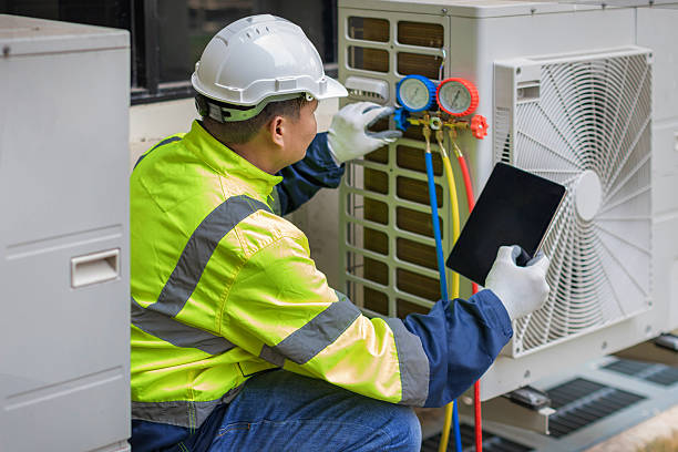 Professional Air Conditioning Repair technician working in Audubon, IA